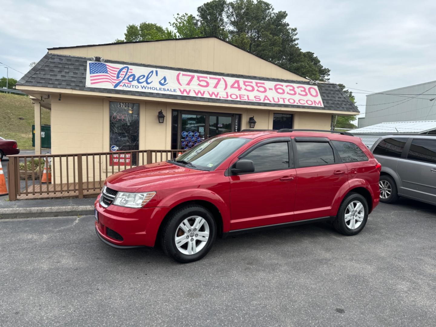 2012 Red /black Dodge Journey SE (3C4PDCAB8CT) with an 2.4L L4 DOHC 16V engine, 4-Speed Automatic transmission, located at 5700 Curlew Drive, Norfolk, VA, 23502, (757) 455-6330, 36.841885, -76.209412 - Photo#0